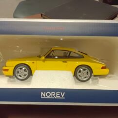 Porsche 911 Carrera 2 1990 (yellow) 1:18