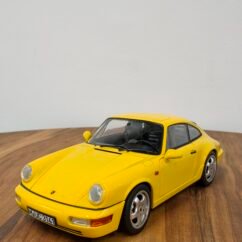 Porsche 911 Carrera 2 1990 Yellow 1:18