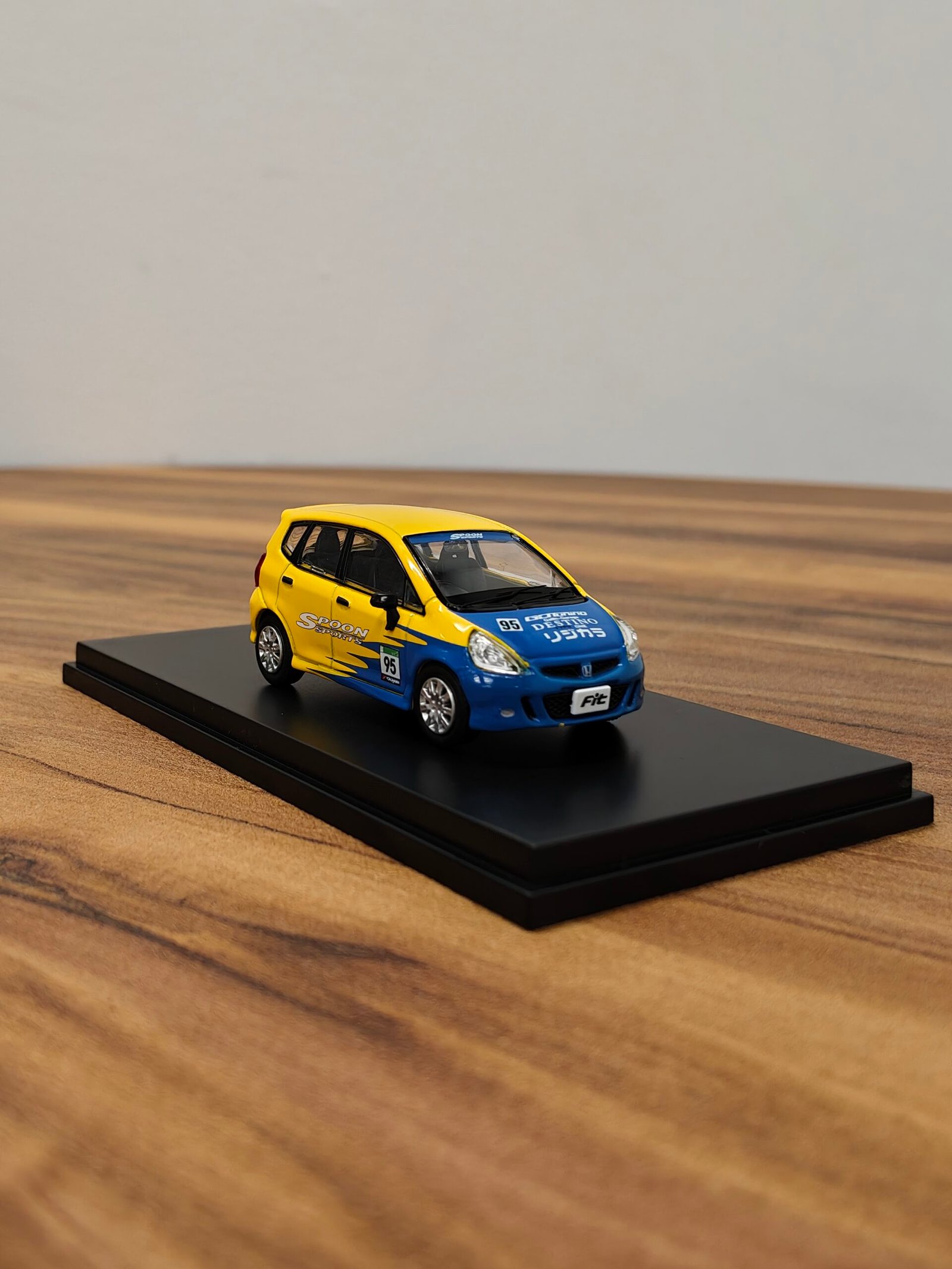 Honda 95 Fit Yellow with Blue 1:64 - Image 2