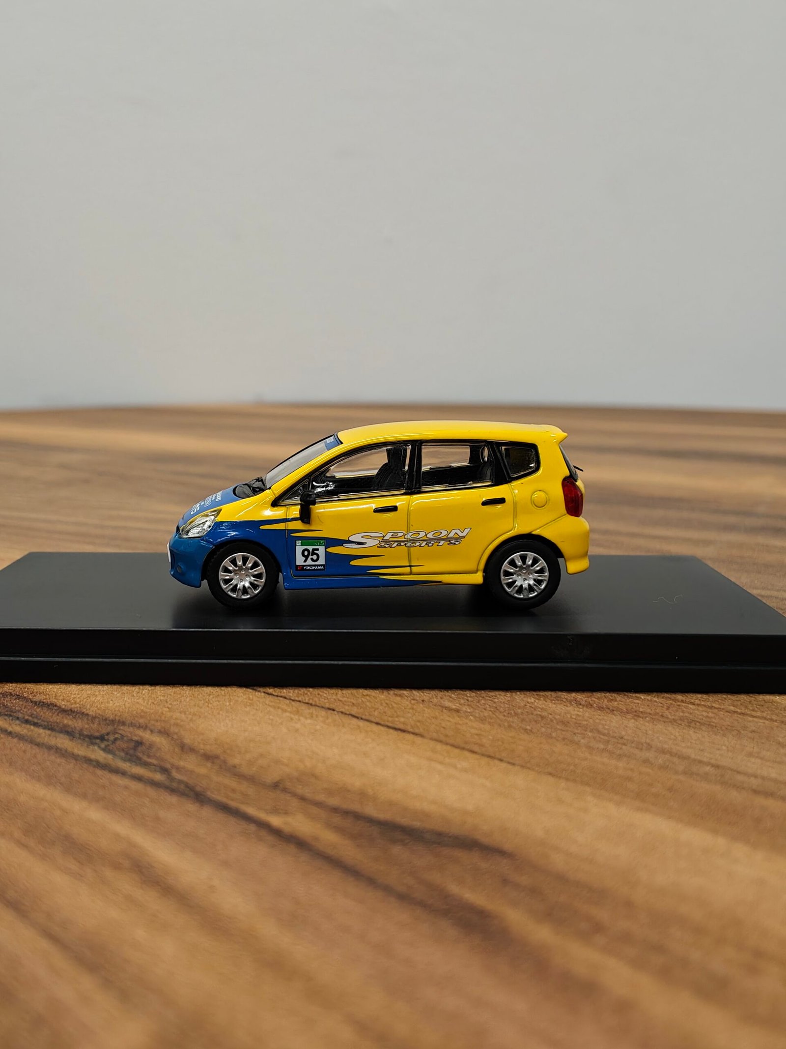 Honda 95 Fit Yellow with Blue 1:64 - Image 3