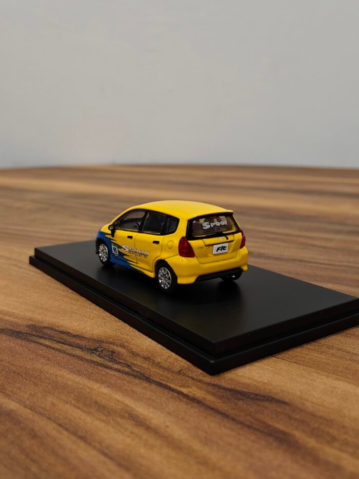 Honda 95 Fit Yellow with Blue 1:64 - Image 4