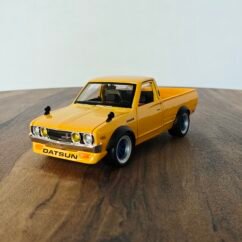 1973 Datsun 620 Pick Up (Yellow) 1:24