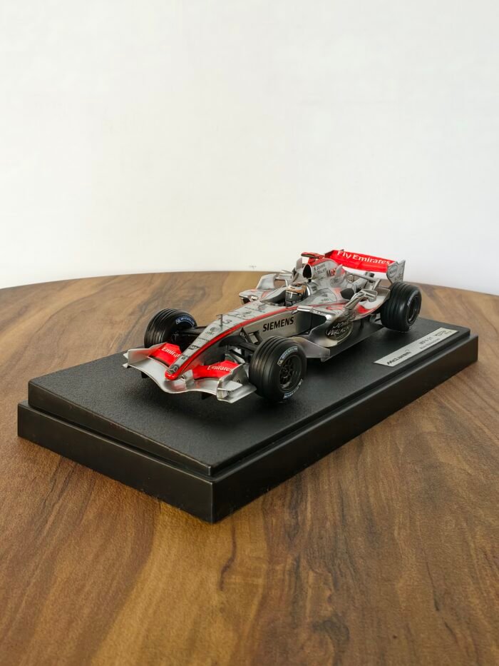 Mclaren  Mp4-21 Kimi Raikonen (Silver with Red) 1:18